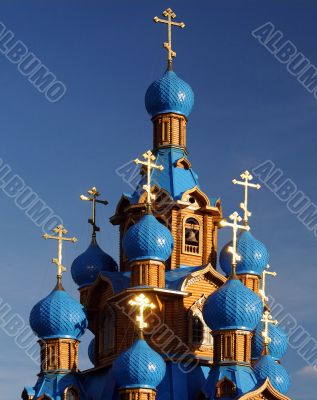 Wooden Orthodox Church with Blue Domes