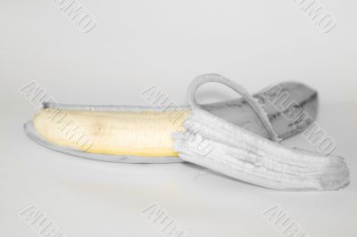 Photo montage of a banana and shell
