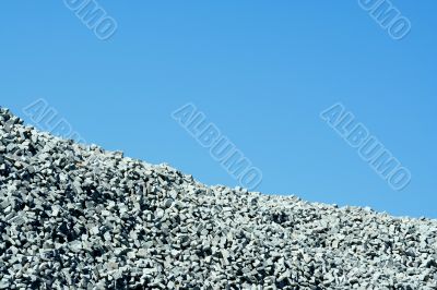 Granite stone pile with blue sky