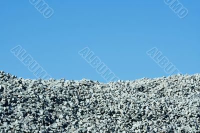 Granite stone pile with blue sky