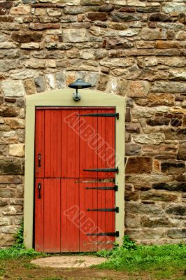Red door on a old stone building