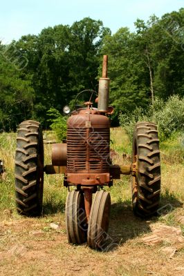 Old rusty farm tractor