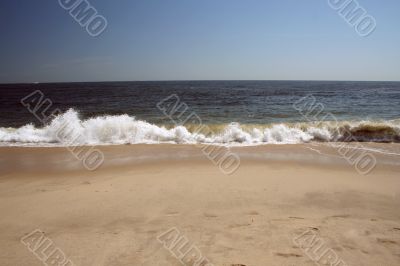 Crashing wave on the beach