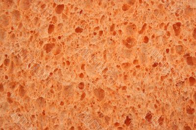 Orange sponge textured background