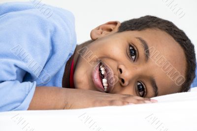 Boy resting in his bed