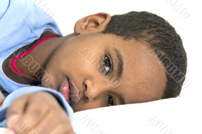 Boy resting in his bed