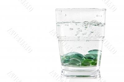 Marbles in a glass of water