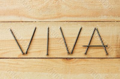 VIVA word is composed with nails 