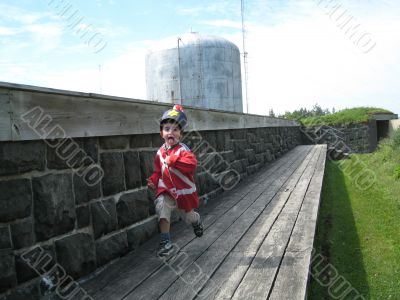 little boy disguised in british soldier