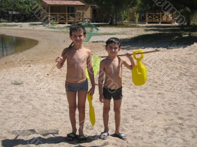 two boys going to the beach
