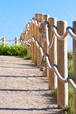 Pathway with wood post fence