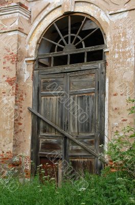 Locked Door of Abandoned Church