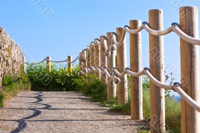 Pathway with wood post fence