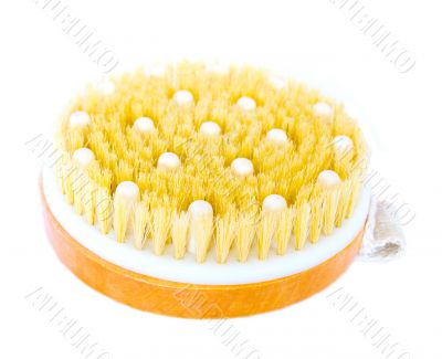 Massage anti-cellulite brush on a white background