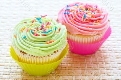 Vanilla cupcakes with strawberry and lime icing
