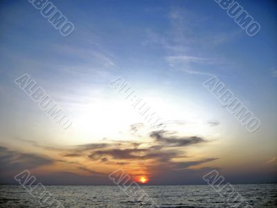 Bright sunset and the sea