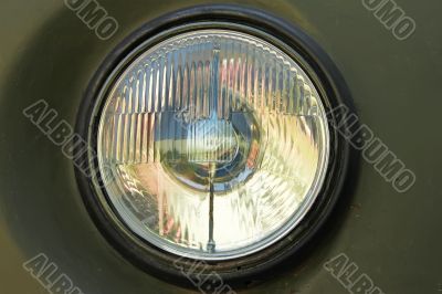 Old car round headlight