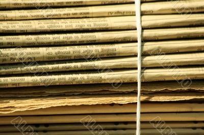 Stacks of newspapers background
