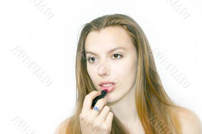 applying lipstick