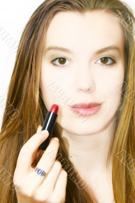 applying lipstick