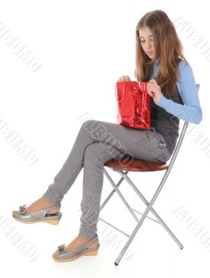 Girl looking in bag