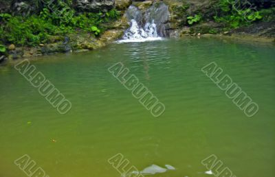 Small waterfall and wide river