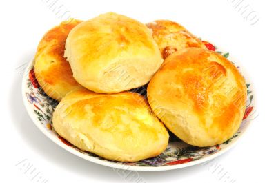 baked buns on a plate