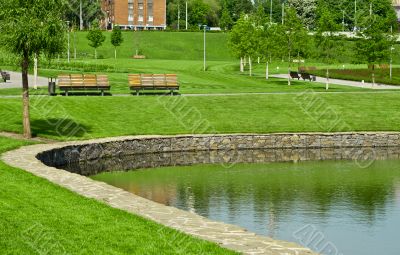 wooden bench in a city park