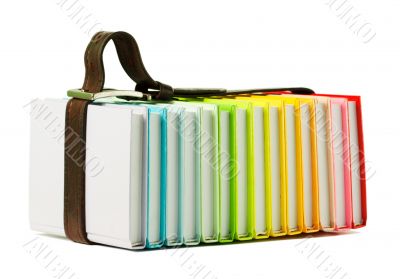 Stack of colorful books on the white background