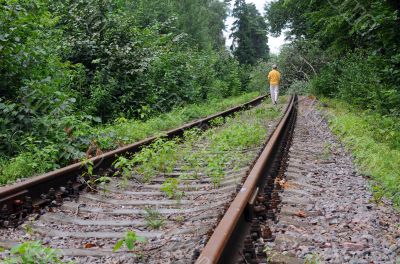 Walking Away Down Abandoned Railroad Track