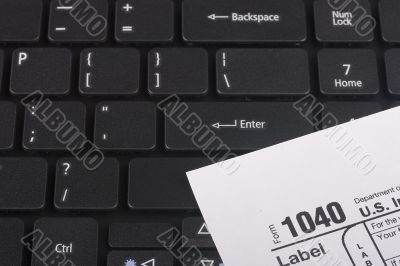 Laptop with a form 1040