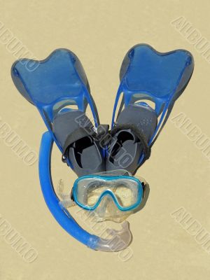 blue googles, snorkel and flippers