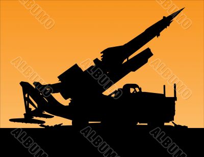 sunset silhouette of a rocket launcher