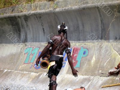 Afro american man walking along the beach