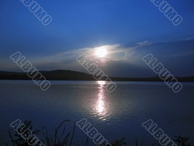 Sun over the lake Tambukan