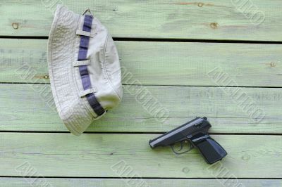 Hat and Pistol on the Wall