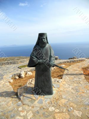 A monk with arms in hand