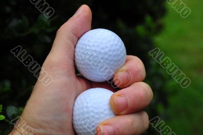 Golf Balls in the Hand