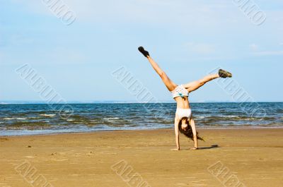 Exercising on the beach