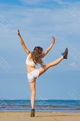 Exercising on the beach