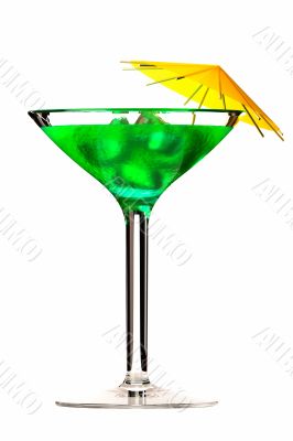 Martini glass with green  coctail  on white