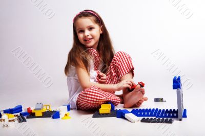 The small cheerful girl
