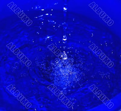  water droplets on a blue background