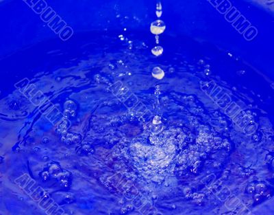  water droplets on a blue background