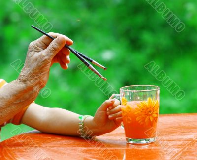Hands of young and old artists