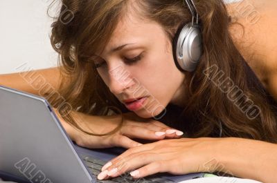 Beautiful girl listens to music
