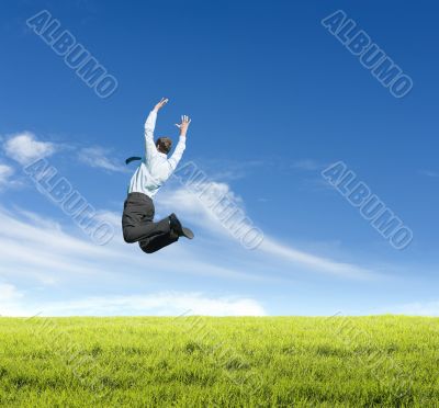 man jumping on  meadow