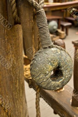 Old rope and wooden block pulleys