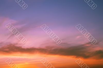 Multicolour clouds at sunset