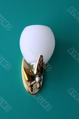 Wall Lamp Against Green Background